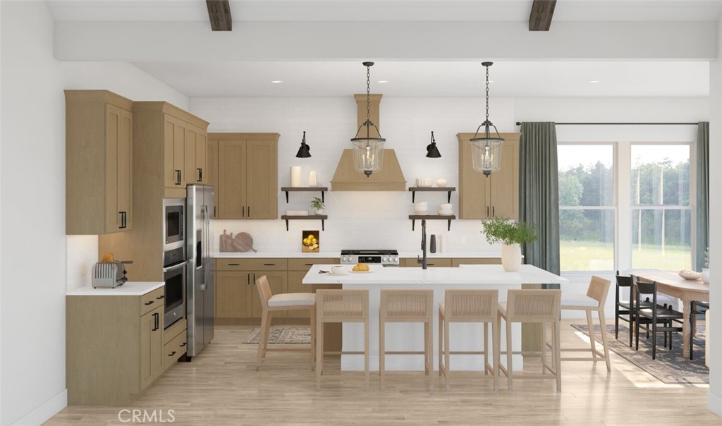 19424 Cereus Road Apple Valley, CA 92307 - Photo 3 of 12 a dining room with stainless steel appliances furniture a window and kitchen view