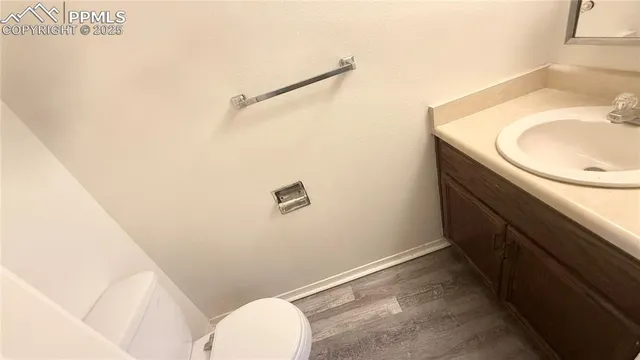 a bathroom with a sink and toilet