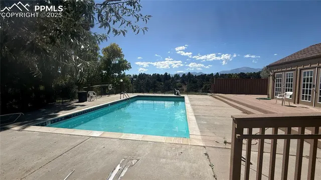 a balcony view with a garden