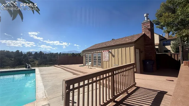 a view of outdoor space with garden and trees