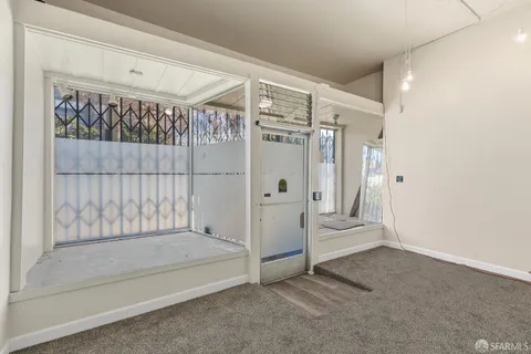 a kitchen with a sink cabinets and window