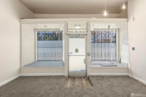 a kitchen with stainless steel appliances a refrigerator stove and sink