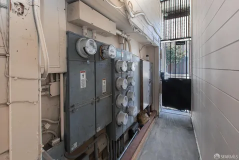 a view of a backyard with plants and entertaining space