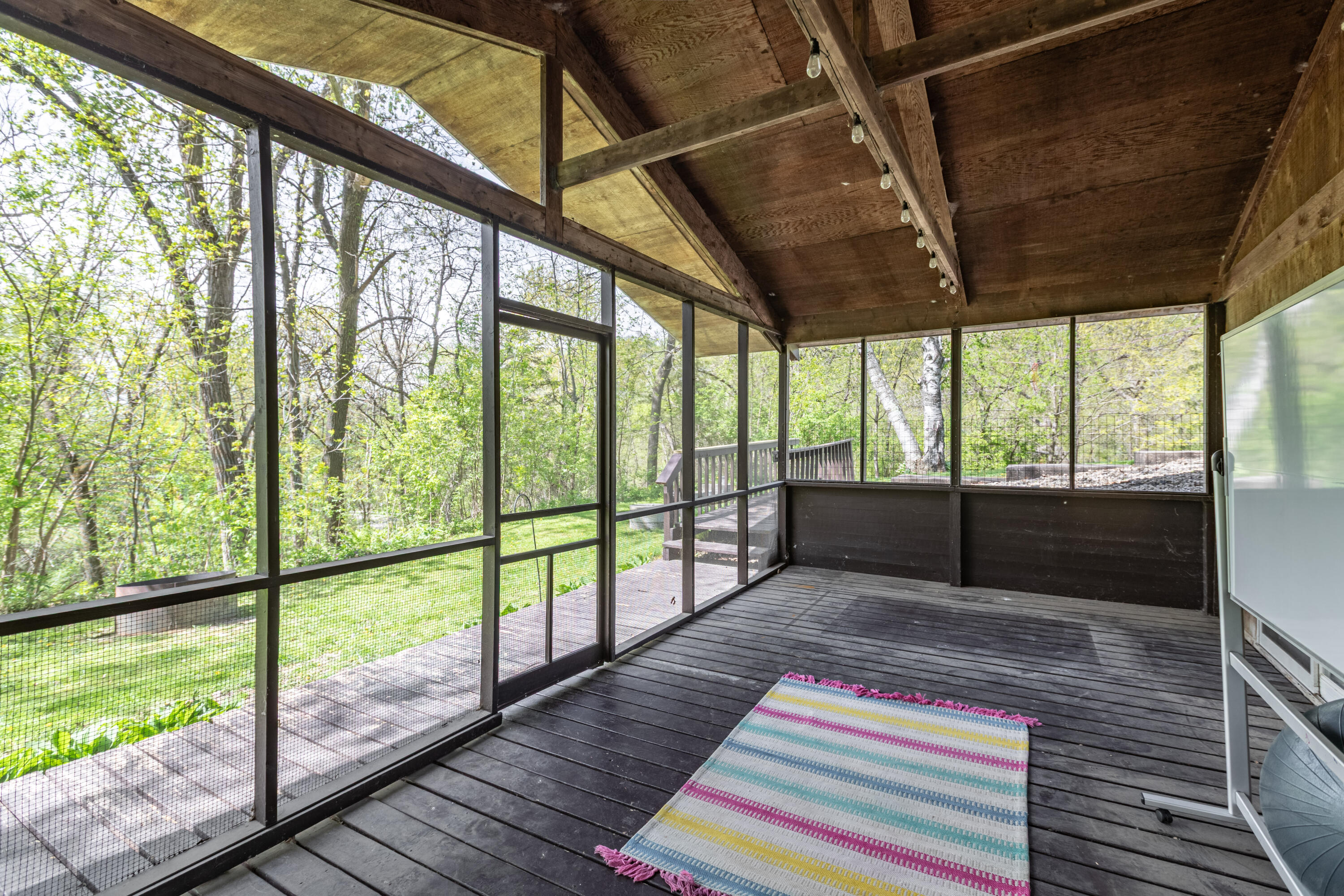 S3532 Chicken Valley Road Buffalo, WI 54629 - Photo 18 of 23 Lovely screened in porch!