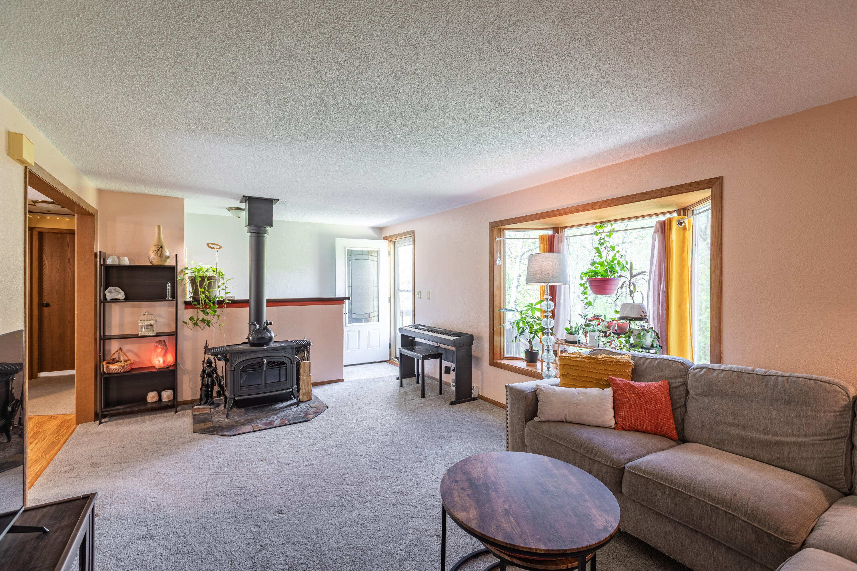 S3532 Chicken Valley Road Buffalo, WI 54629 - Photo 2 of 23 Spacious living room with natural fireplace