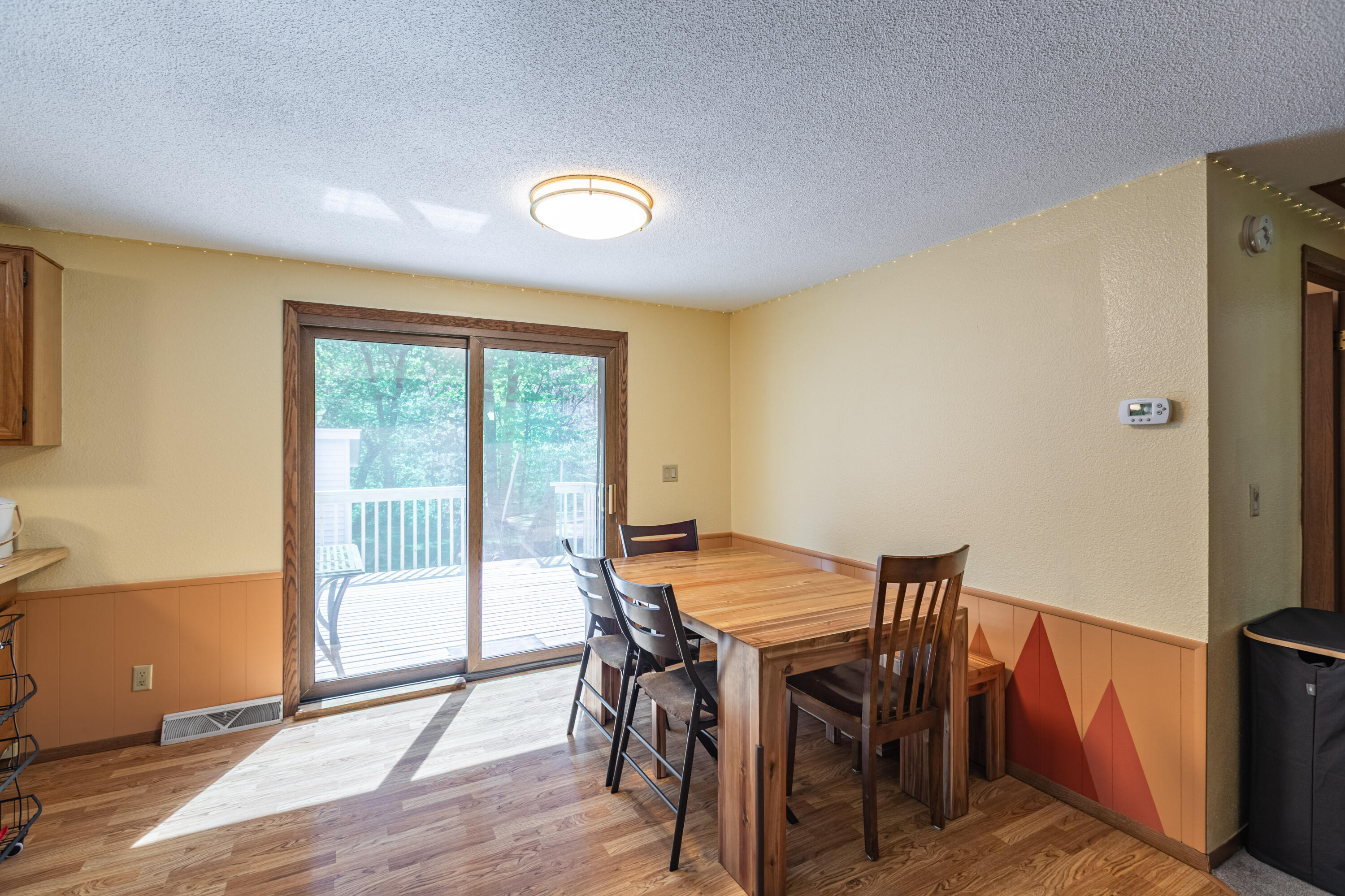 S3532 Chicken Valley Road Buffalo, WI 54629 - Photo 6 of 23 Open dining area off new composite deck!