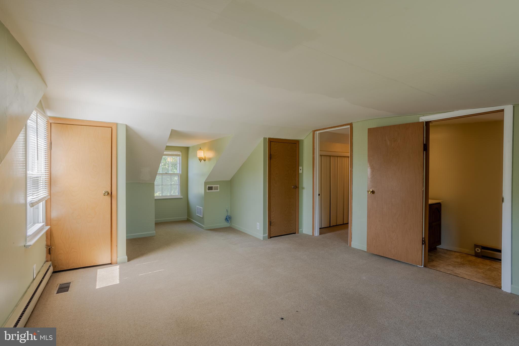 3612 Churchville Road Aberdeen, MD 21001 - Photo 20 of 49 an empty room with closet and wooden door