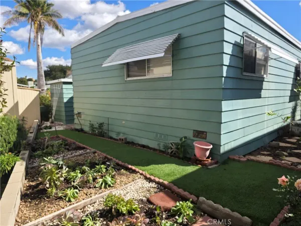a wooden house with a outdoor space