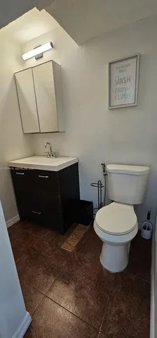 a view of a hallway with windows