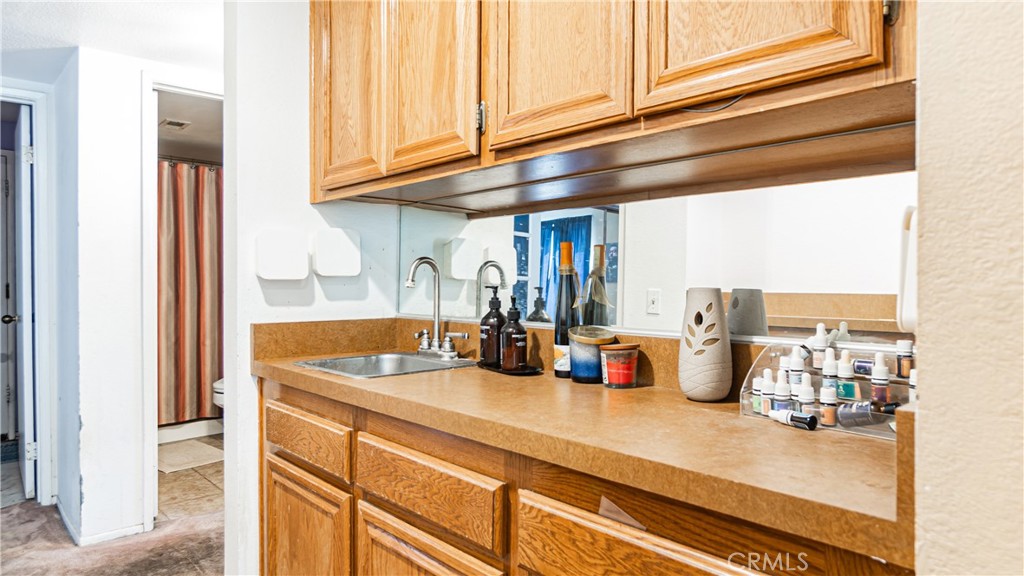 24220 Mentry Drive Newhall, CA 91321 - Photo 18 of 50 a kitchen with a sink and a window