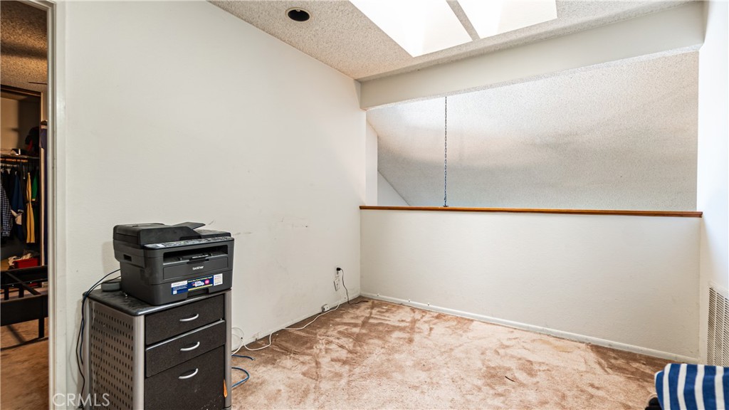 24220 Mentry Drive Newhall, CA 91321 - Photo 33 of 50 a view of a dresser