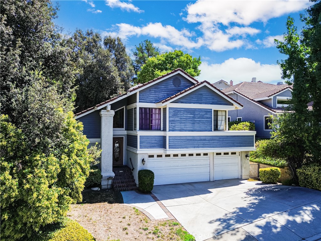 24220 Mentry Drive Newhall, CA 91321 - Photo 41 of 50 a view of house with outdoor space and entertaining space