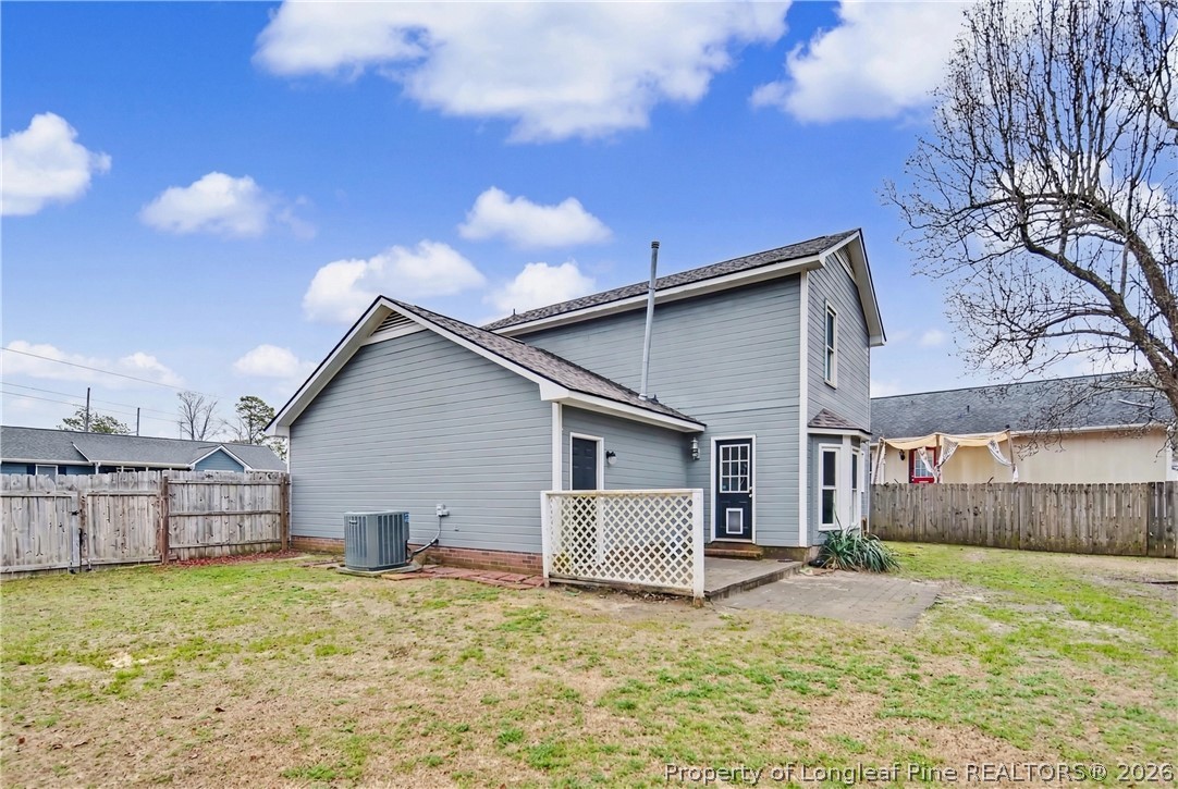 5073 Linton Hall Road Fayetteville, NC 28311 - Photo 30 of 32 a view of a house with a yard