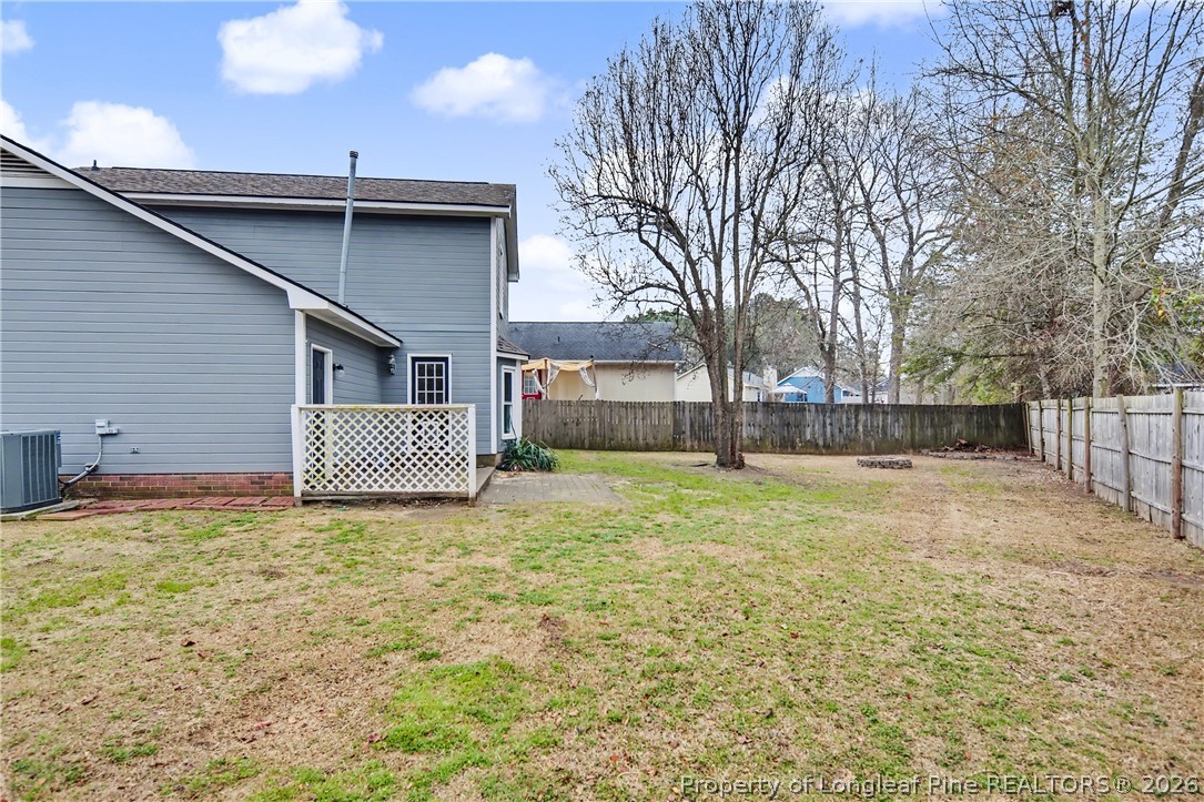 5073 Linton Hall Road Fayetteville, NC 28311 - Photo 31 of 32 a view of a house with a yard