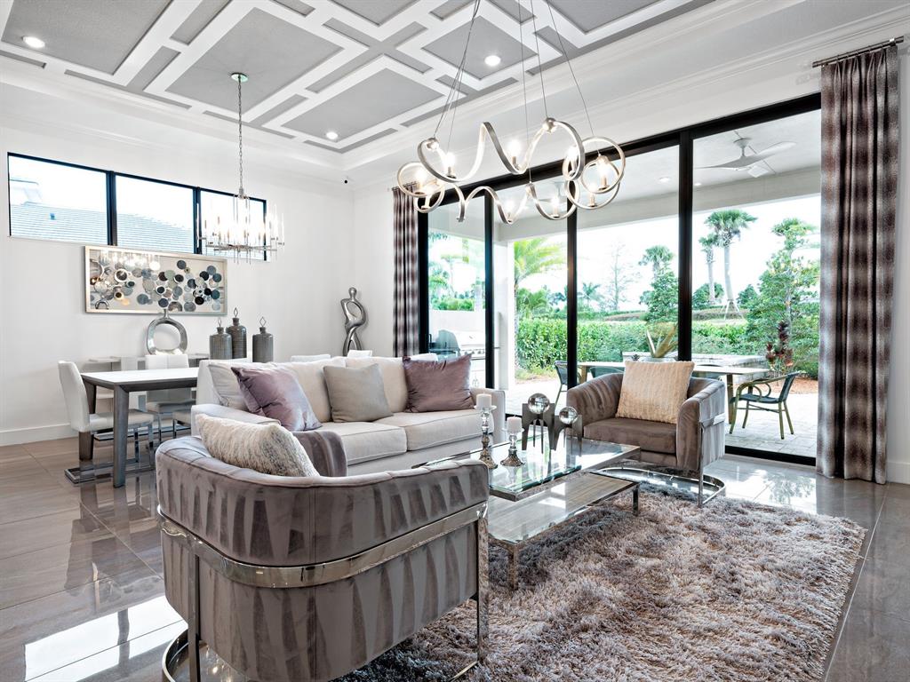 8146 Southwest Vanita Way Port St. Lucie, FL 34987 - Photo 13 of 53 a living room with furniture and a large window