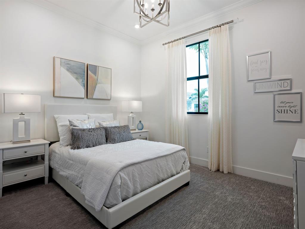 8146 Southwest Vanita Way Port St. Lucie, FL 34987 - Photo 26 of 53 a bedroom with a bed and a window