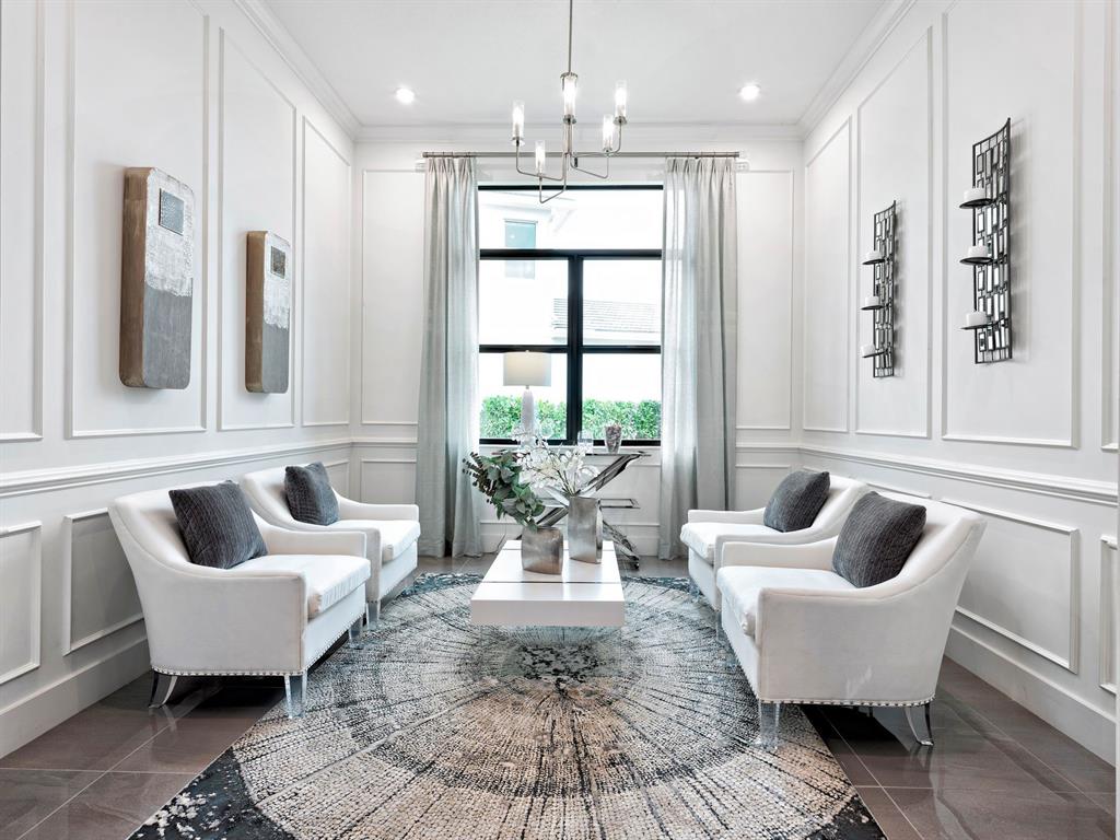 8146 Southwest Vanita Way Port St. Lucie, FL 34987 - Photo 27 of 53 a living room with furniture and a large window