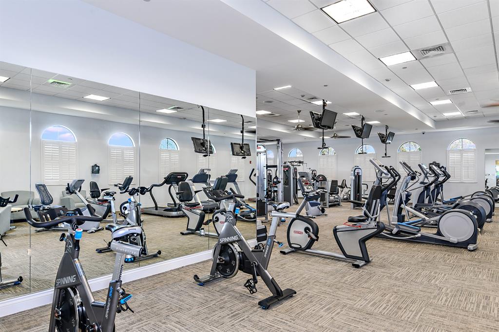 8146 Southwest Vanita Way Port St. Lucie, FL 34987 - Photo 41 of 53 a view of a room with gym equipment