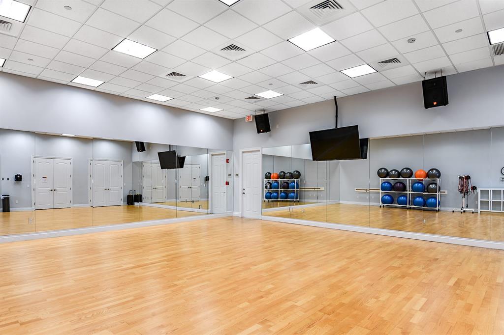 8146 Southwest Vanita Way Port St. Lucie, FL 34987 - Photo 44 of 53 a view of a room with gym equipment