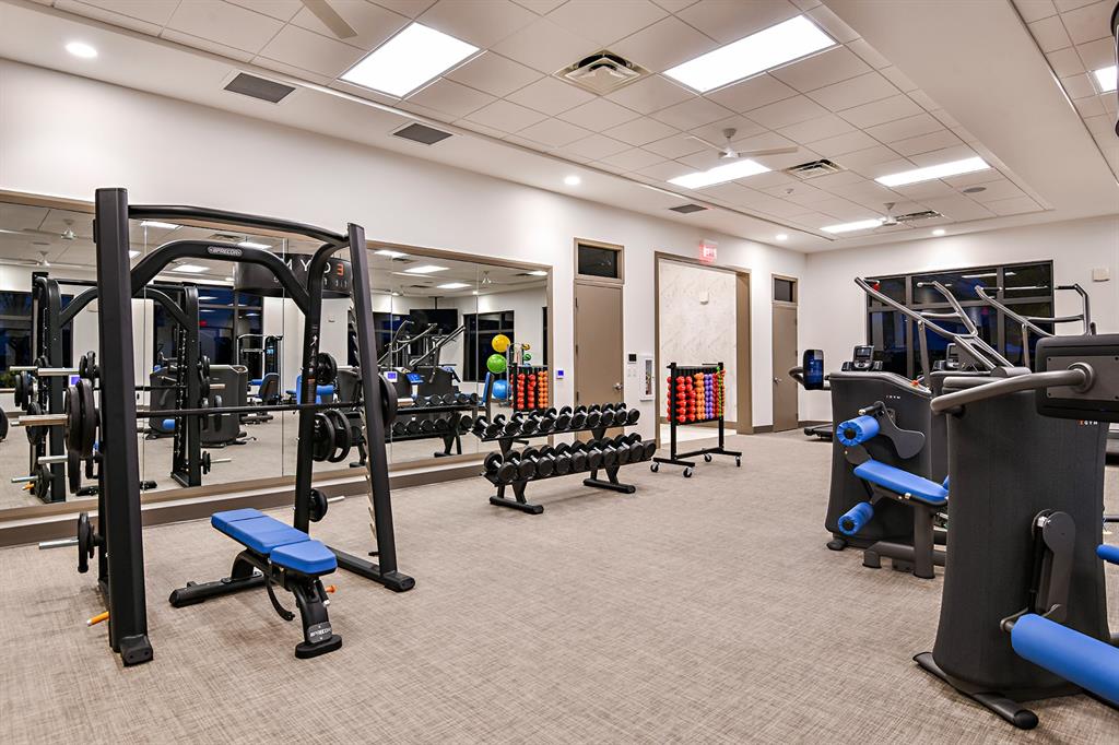 8146 Southwest Vanita Way Port St. Lucie, FL 34987 - Photo 49 of 53 a view of a room with gym equipment
