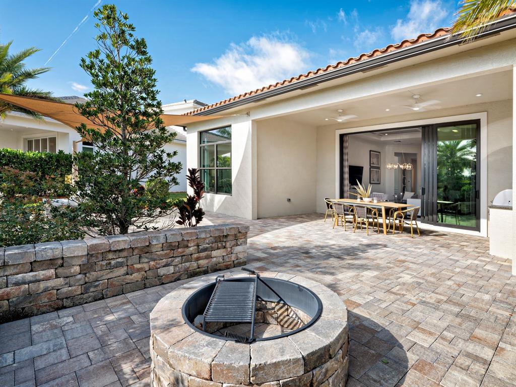 8146 Southwest Vanita Way Port St. Lucie, FL 34987 - Photo 6 of 53 a view of swimming pool with outdoor seating