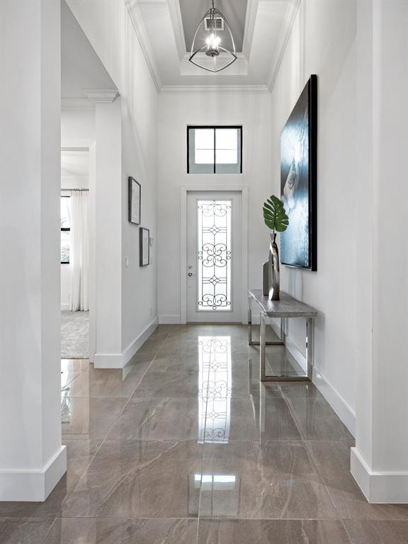 8146 Southwest Vanita Way Port St. Lucie, FL 34987 - Photo 8 of 53 a view of an entryway with a livingroom