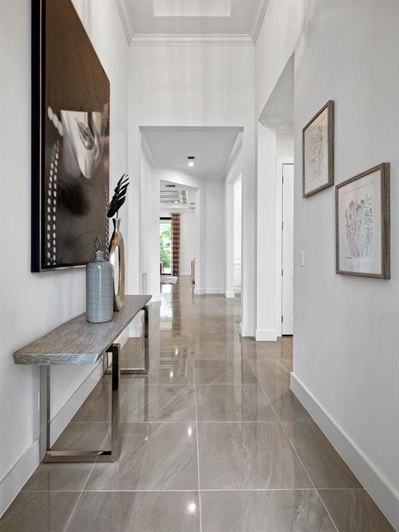 8146 Southwest Vanita Way Port St. Lucie, FL 34987 - Photo 9 of 53 a view of a hallway with seating area and entryway