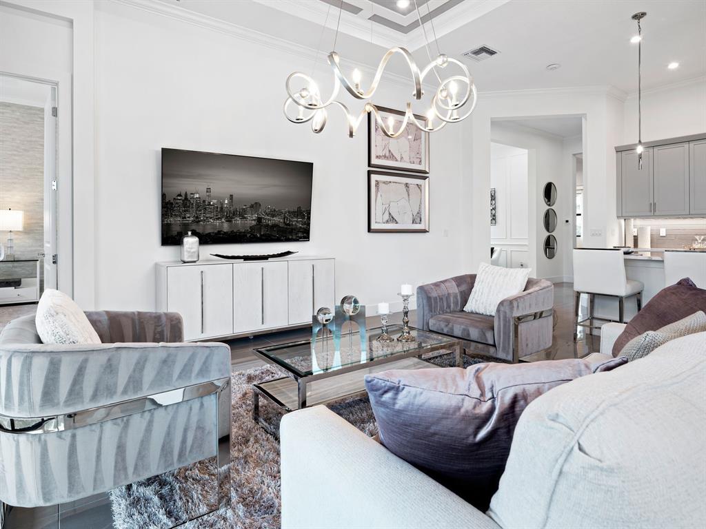 8146 Southwest Vanita Way Port St. Lucie, FL 34987 - Photo 10 of 53 a living room with furniture and a flat screen tv