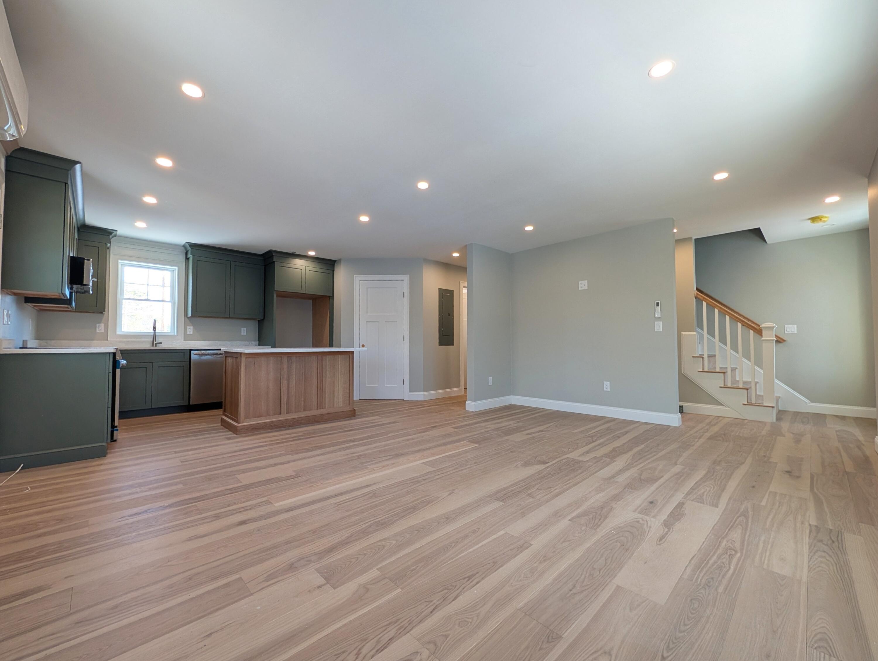 46 B Holt Road Bourne, MA 02532 - Photo 4 of 14 a view of a kitchen with a sink and a refrigerator
