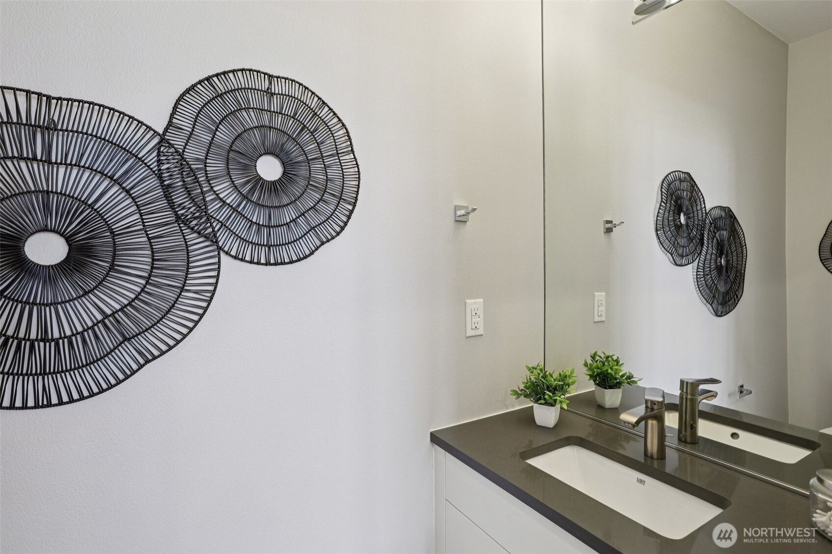 5017 Delridge Way Southwest, Unit A Seattle, WA 98106 - Photo 14 of 26 a bathroom with a sink and mirror