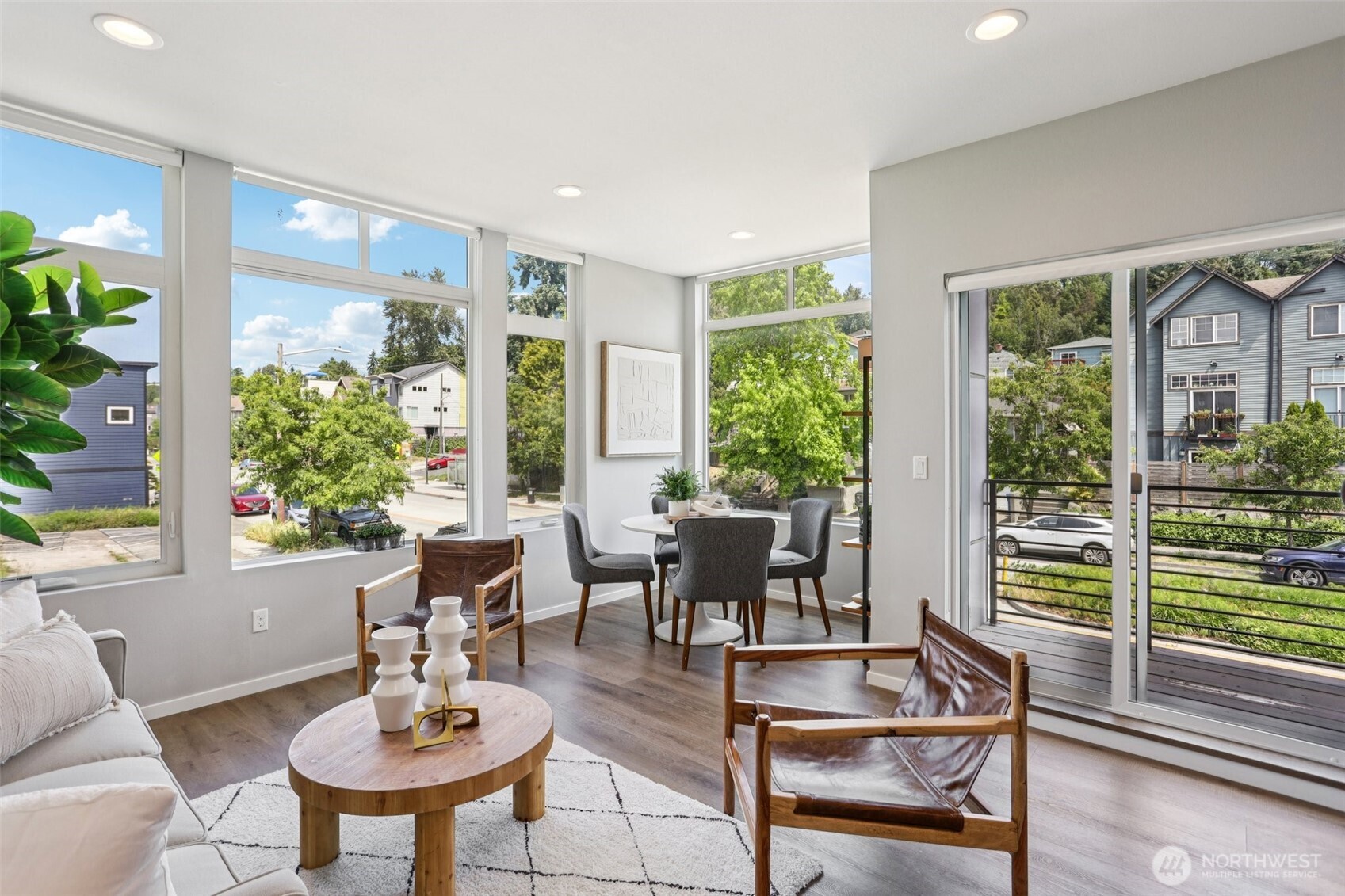 5017 Delridge Way Southwest, Unit A Seattle, WA 98106 - Photo 4 of 26 a living room with furniture and a potted plant