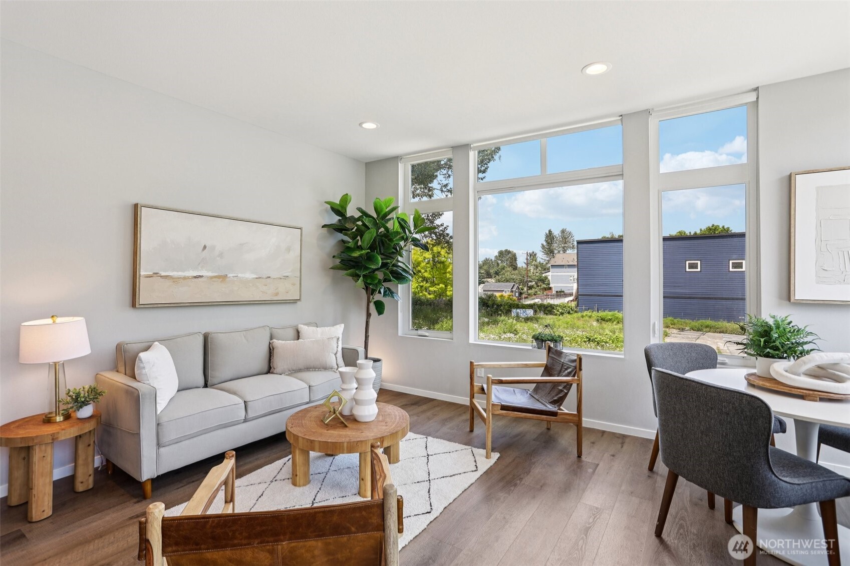 5017 Delridge Way Southwest, Unit A Seattle, WA 98106 - Photo 6 of 26 a living room with furniture and a large window
