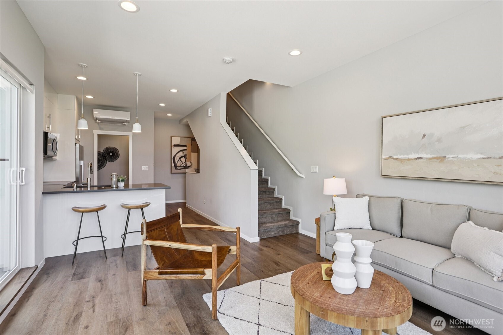 5017 Delridge Way Southwest, Unit A Seattle, WA 98106 - Photo 8 of 26 a living room with furniture and wooden floor