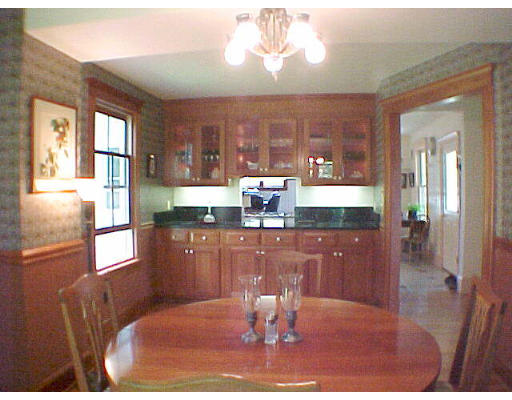 130 Old Post Road Worthington, MA 01098 - Photo 4 of 6 a dining room with furniture a chandelier and wooden floor