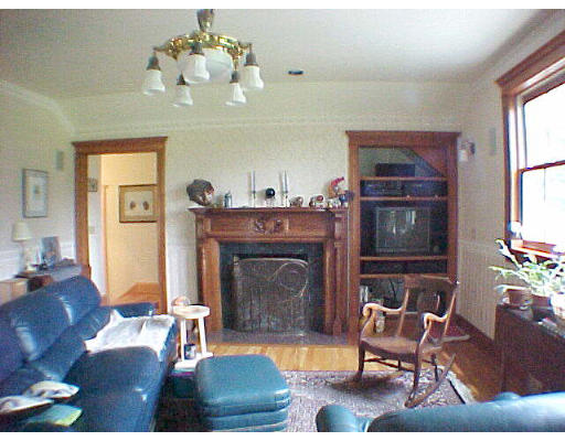 130 Old Post Road Worthington, MA 01098 - Photo 6 of 6 a living room with furniture a chandelier and a fireplace