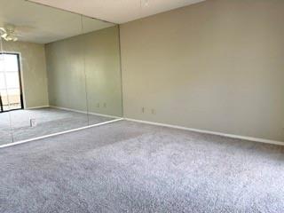 1801 West Spring Creek Parkway, Unit F1 Plano, TX 75023 - Photo 6 of 8 an empty room with window