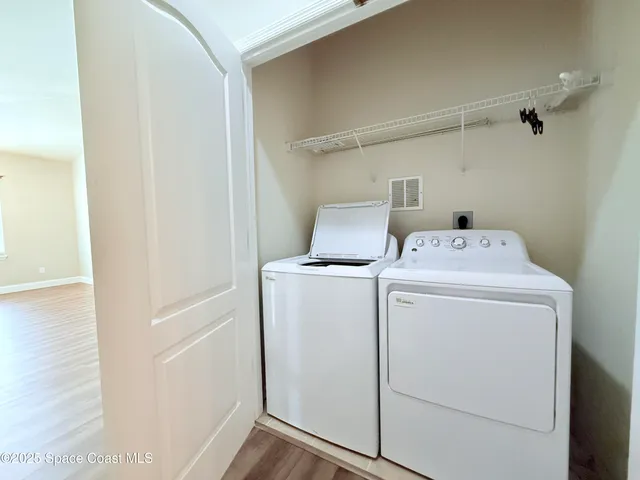 a view of a room with racks on the wall