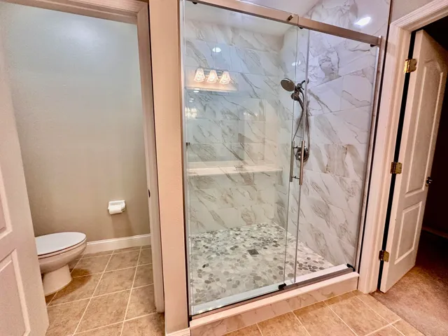 a view of a backyard with a lake view