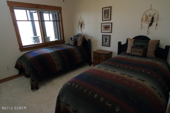 164 Cozens Ridge Fraser, CO 80442 - Photo 23 of 45 lower level bedroom 2 view 1