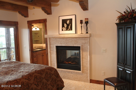 164 Cozens Ridge Fraser, CO 80442 - Photo 28 of 45 master bedroom fireplace