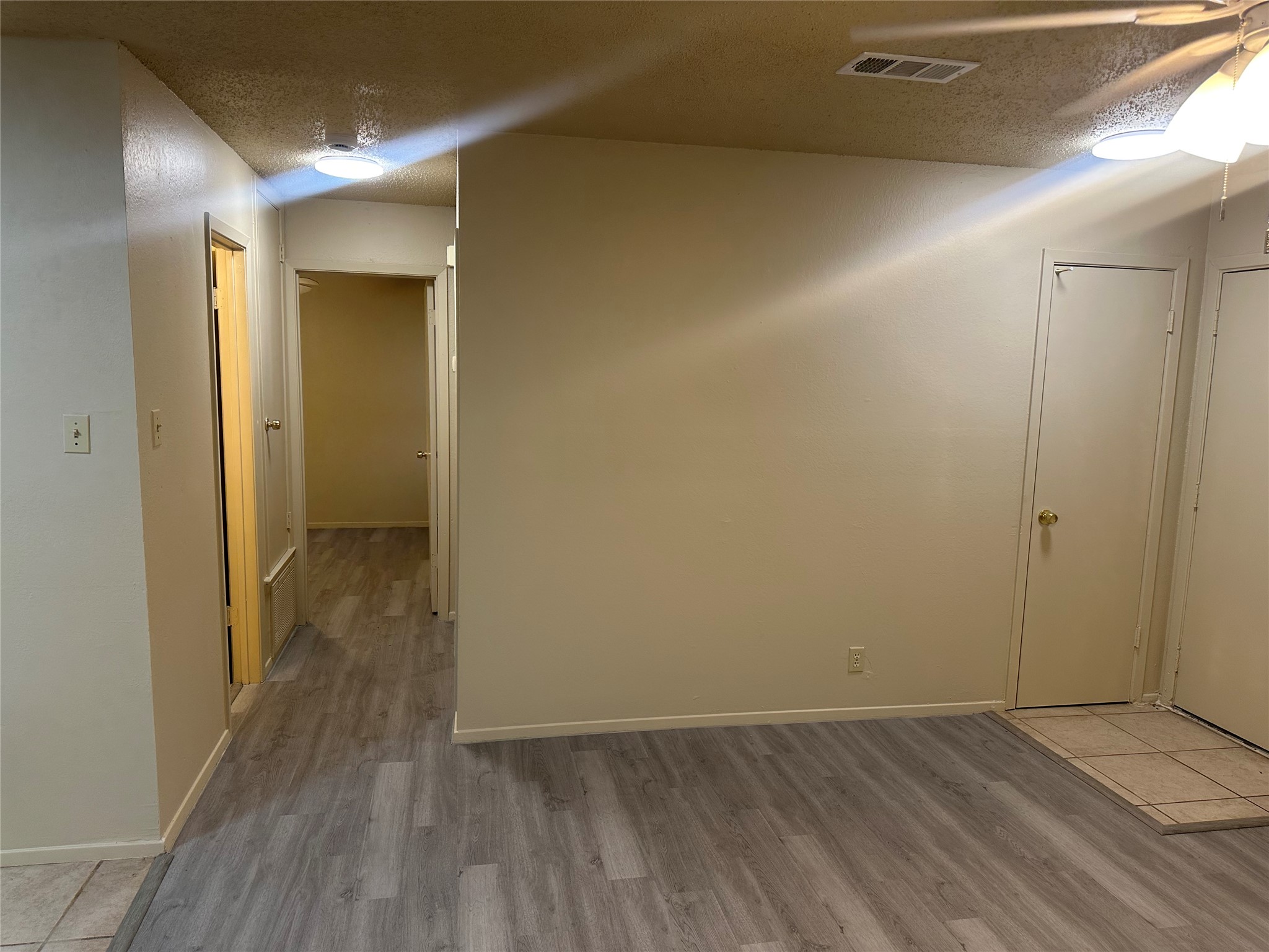 2602 South Bagdad Road, Unit A Leander, TX 78641 - Photo 23 of 26 Clean, spacious interior with modern flooring and well-lit hallways.