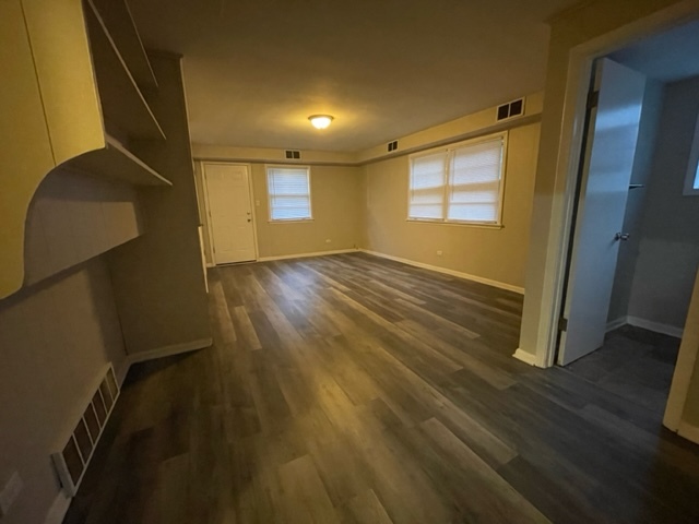1424 Willow Road Homewood, IL 60430 - Photo 9 of 17 a view of empty room with wooden floor