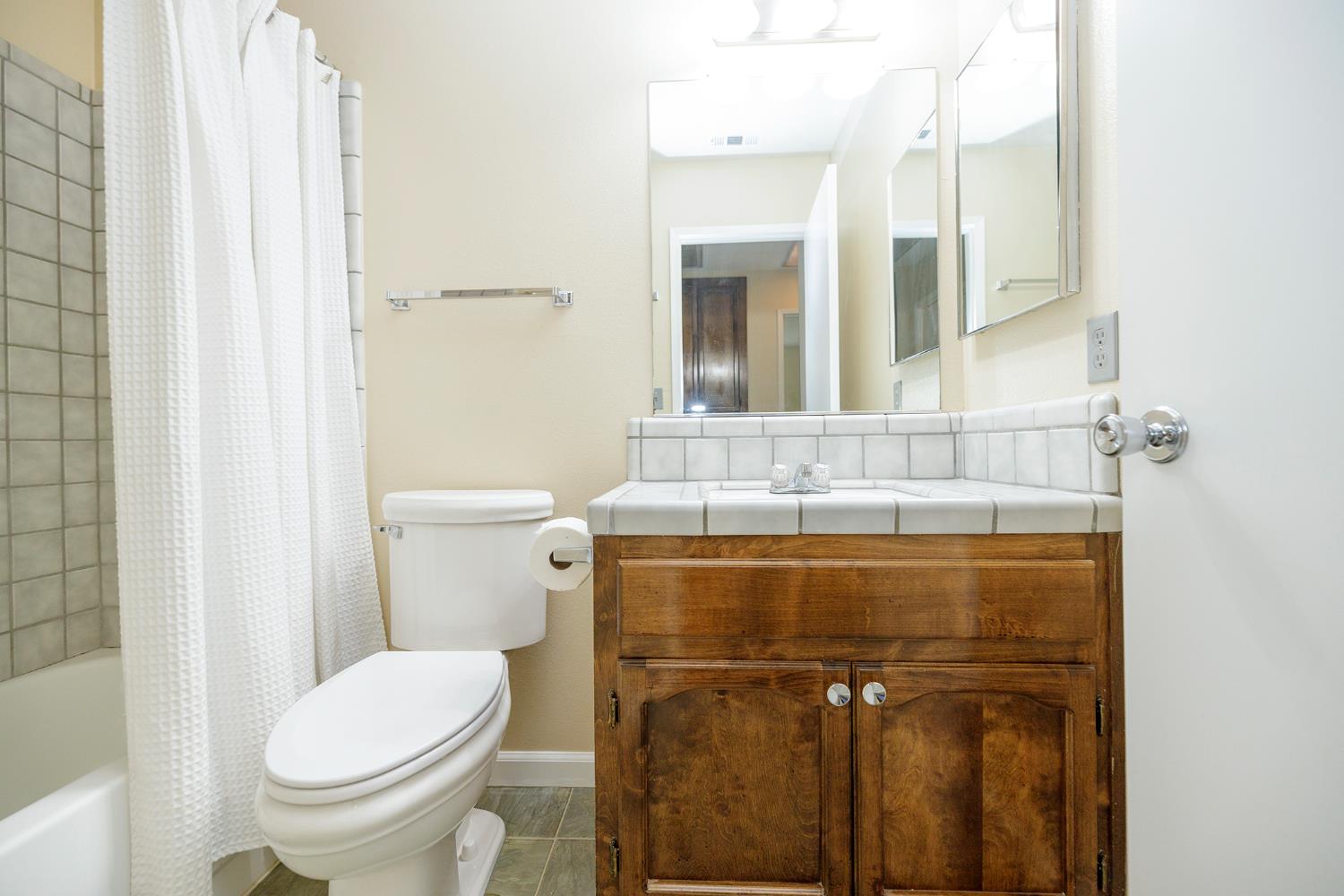1124 Tasmania Way Modesto, CA 95356 - Photo 29 of 34 a bathroom with a sink and toilet