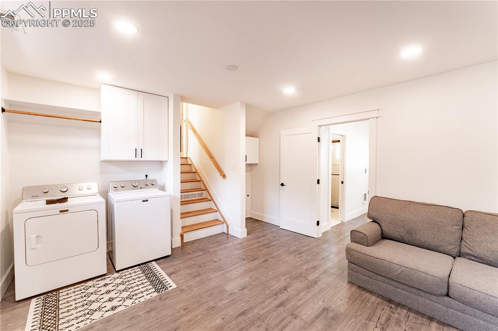 2502 Templeton Gap Road Colorado Springs, CO 80907 - Photo 23 of 34 Lower Level Laundry & Living Room Area