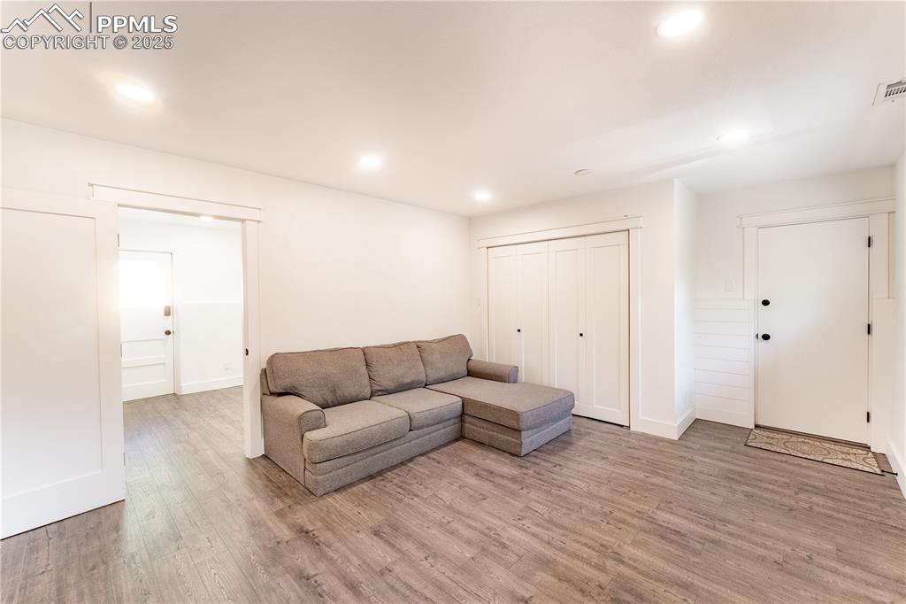 2502 Templeton Gap Road Colorado Springs, CO 80907 - Photo 24 of 34 Lower Level Laundry & Living Room Area