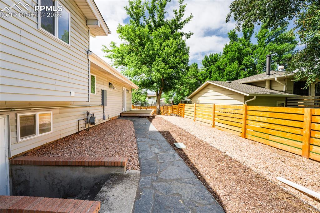 2502 Templeton Gap Road Colorado Springs, CO 80907 - Photo 34 of 34 Direct Entrance To Lower Level Bedroom
