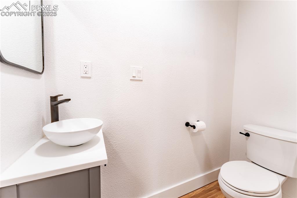 2502 Templeton Gap Road Colorado Springs, CO 80907 - Photo 10 of 34 Main Level Half Bath