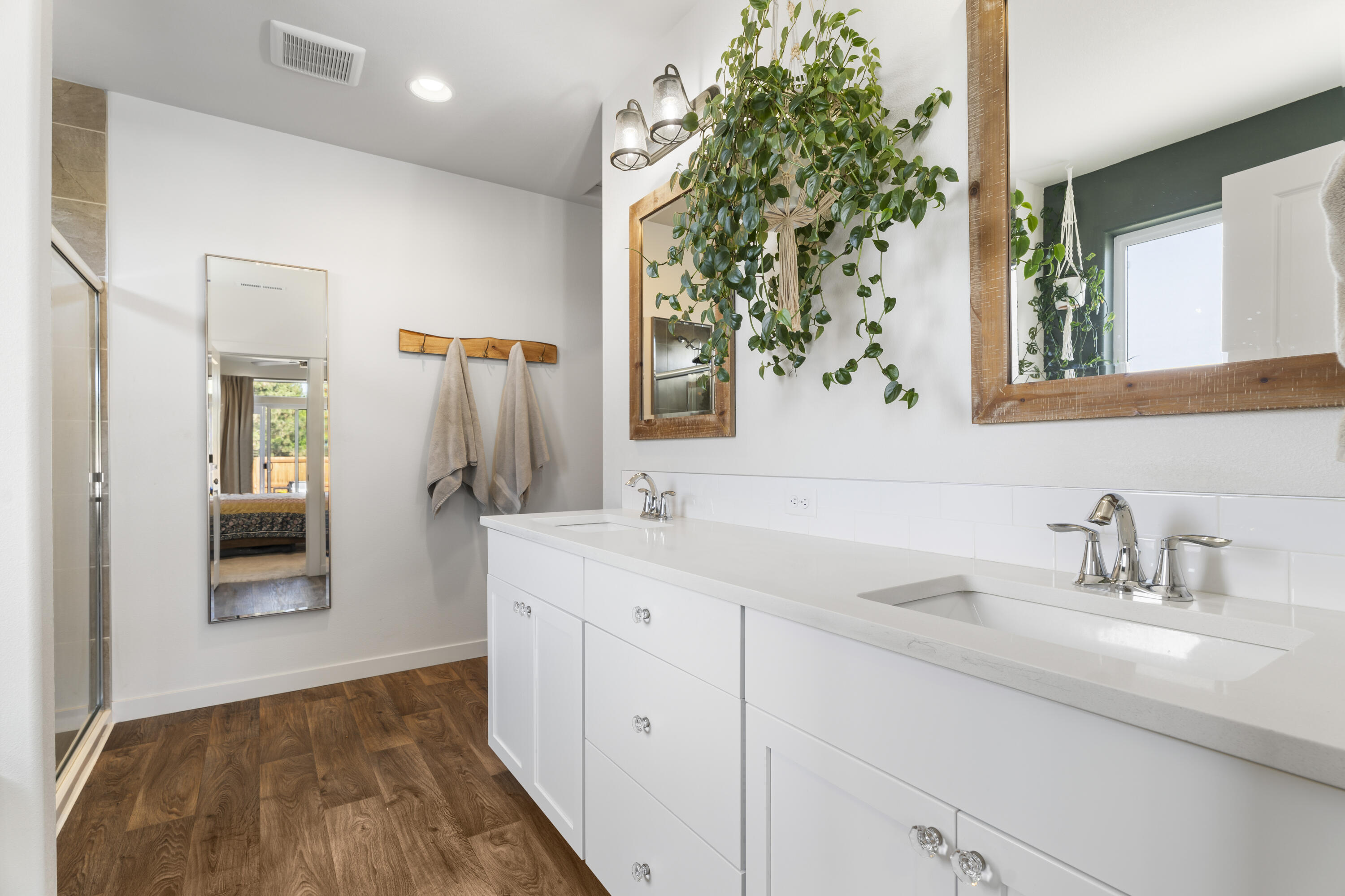 21030 Yeoman Road Bend, OR 97701 - Photo 21 of 66 a bathroom with a sink and a mirror