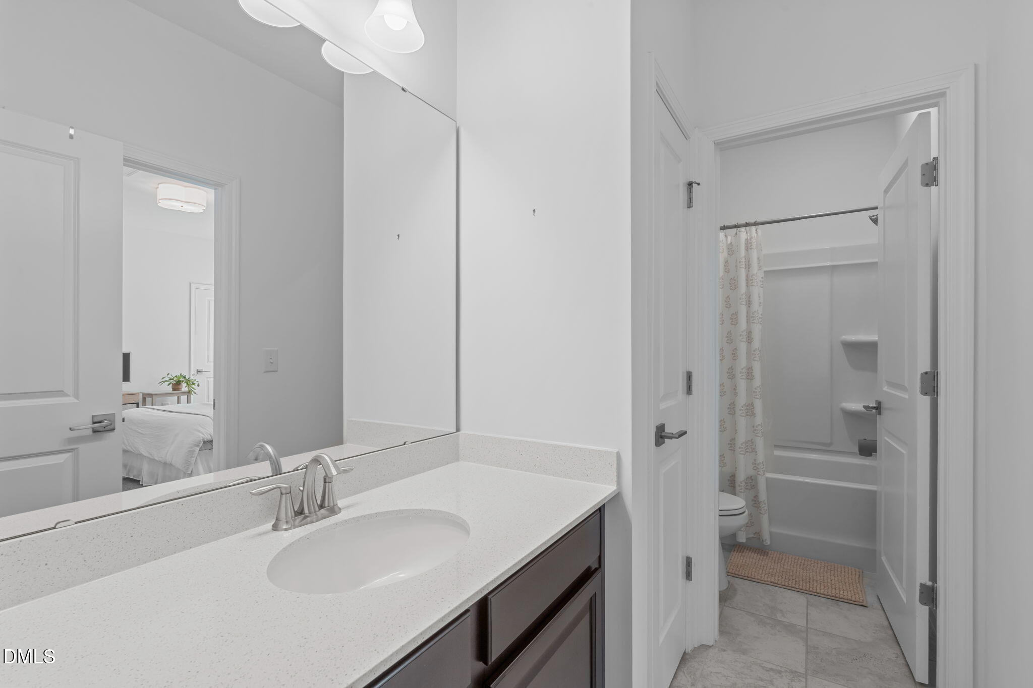 6616 Truxton Lane Raleigh, NC 27616 - Photo 30 of 42 a bathroom with a sink and a mirror