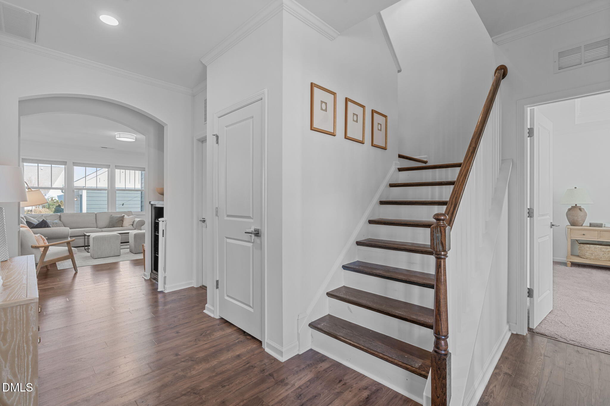 6616 Truxton Lane Raleigh, NC 27616 - Photo 4 of 42 a view of entryway and hall with wooden floor